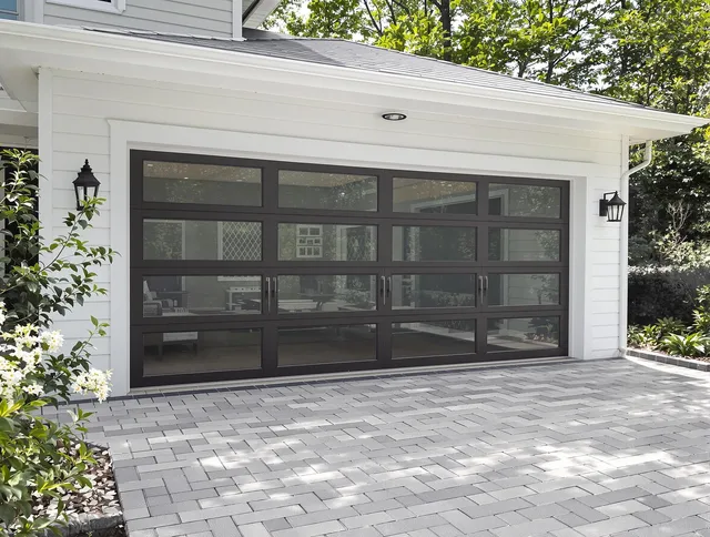 Middleburg Heights Garage Door Repair design specialist presenting custom garage door options to Middleburg Heights homeowner