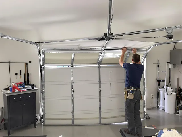 Middleburg Heights Garage Door Repair specialist performing precise section replacement on Middleburg Heights garage door