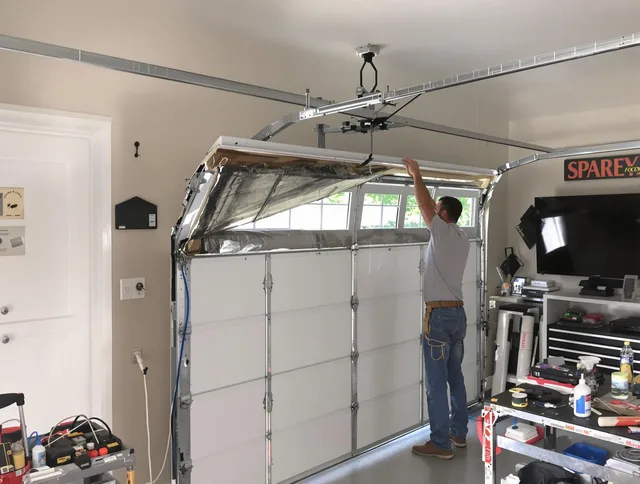Garage door section replacement by Middleburg Heights Garage Door Repair in Middleburg Heights